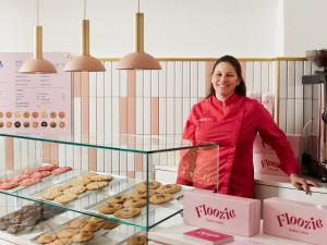 a photo of a woman in a bakery