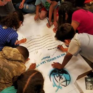 Kids pledge to live drug-free.