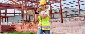 Woman on Construction Site Wearing Properly Sized PPE