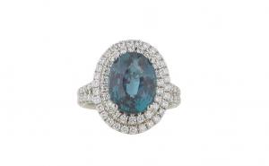 Exceedingly rare lady’s platinum dinner ring with a 7.96-carat Indian oval alexandrite center stone, surrounded by a double concentric border of tiny round diamonds (est. $70,000-$90,000).