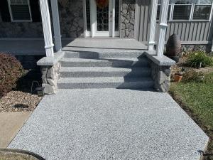 A beautiful porch and sidewalk with a durable, slip-resistant finish from GRANIFLEX epoxy floor coating.