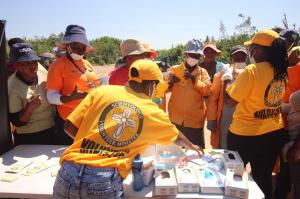Scientology Volunteer Ministers distributing hygiene promotional material.