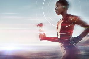 mixed race athlete with bluetooth LE audio wearables demonstrating radio waves and agility