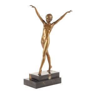 Stunning bronze nude gymnast by the renowned German sculptor Ferdinand Preiss (1882-1943), cast by Preiss & Kassler (Berlin), on an onyx and black marble base (est. CA$8,000-$12,000).