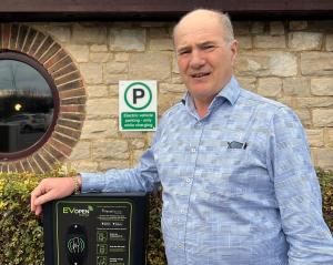 Many electric car owners are reluctant to travel far from home, says Martin Cox