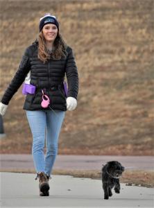 Walking the dog with The Dog Pouch(tm) puts everything you need for a walk at your fingertips