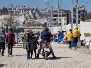 A tent village in Turkey now stands in the shadow of the remnants of what were once the homes and apartments of those sheltering here.