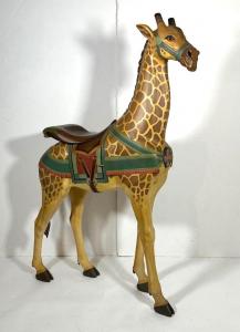 Carved and painted carousel giraffe, crafted circa 1910 by Gustav and William Dentzel, professionally restored, 64 ½ inches tall with inset glass eyes ($9,840).