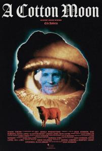 A movie poster featuring a reflection of Eric Roberts with a sinister smile and a sheep overlaid over a close up of an eye.