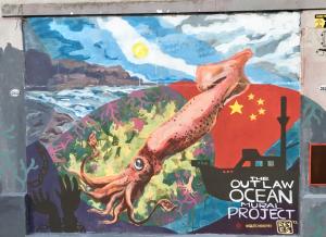 mural painted in a wall of a giant squid over the figs of Uruguay and China