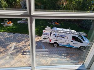 My Window Washing van as seen through a clean second story window.