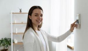 Woman Using Air Conditioner