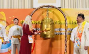 Founder of USIDHR Rings the Bell of Peace for a Harmonious World at FOWPAL Ceremony
