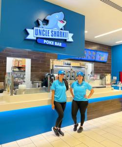 Uncle Sharkii franchisees Arlene and Janette Carvajal pose in front of their Livermore location.