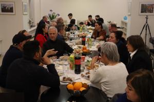 People from different religions joining a Muslim Iftar at the Church of Scientology