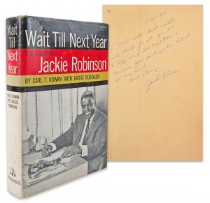 First edition, first printing copy of Jackie Robinson’s biography, Wait Till Next Year, signed and dedicated to Black columnist Carl T. Rowan, who co-wrote the book (est. $18,000-$20,000).