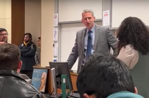 US Judge Kyle S. Duncan confronted by Stanford diversity dean Tirien Steinbach (R)