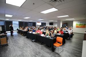 "Coach Aaron Behunin delivering on-site employee training and development at CertainPath"