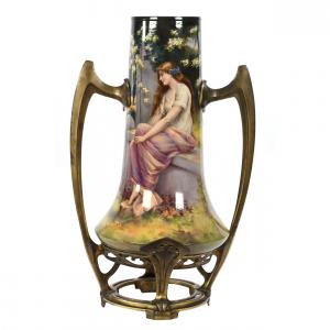Incredible floor vase marked Royal Bonn, 29 inches tall, featuring a beautiful outdoor scene of a young woman on a stone bench wrapped around the vase, which weighs over 29 pounds (est. $2,000-$3,500).
