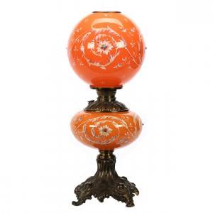 Gone With the Wind kerosene lamp with a shade signed Moser, 24 inches tall, made from cased orange glass with an elaborate floral and scroll design and applied jewel highlights (est. 1,000-$1,750).