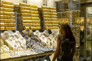 A person checking out gold