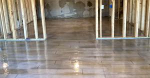 Residential barn with concrete wood floor overlay.