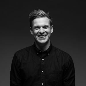 A black and white photograph of Elbaite finance director Calum Buchanan.