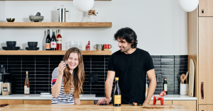 Pioneer Founders, Holly Berrigan & Niclas Jansson holding wine