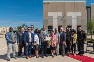 Congresswoman Sheila J. Lee presenting NorthPoint Development with the Certificate of Congressional Recognition