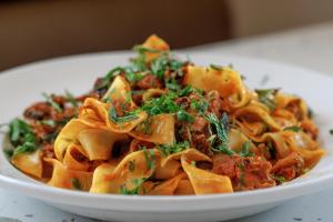 Pulled Pork Pappardelle at Pigzza in Orlando, Florida's Mills 50 District - Image Courtesy of Vanessa Boy