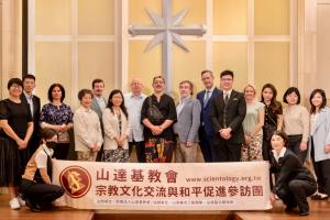 Part of the International delegation after a tour in the Church of Scientology of Kaohsiung.