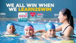 children in pool with a swim instructor, with the caption "we all win when we Learn2Swim"