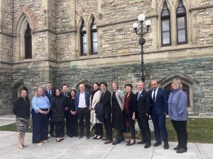 Group of delegates from CASL meeting on Parliament Hill