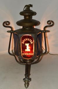 Newburgh Brewster Fire Department engraved building (or horse-drawn hook and ladder fire truck) lantern, electrified but missing a font, circa 1862, 26 inches tall.