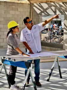 BCB Homes' Carlos Moreno instructs an Immokalee Foundation Engineering & Construction Management Student at The Learning Lab