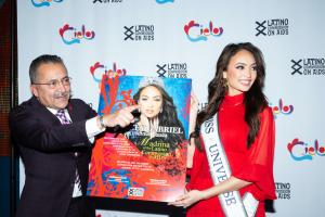 2022 Miss Universe R'Bonney Gabriel being introduced as the newest Madrina of the Latino Commission on AIDS by its President and CEO Guillermo Chacon.