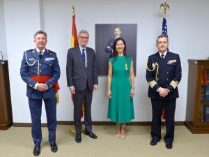 Author Natacha Sanz-Caballero is presented with Naval Medal of Honor with White Distinction at Defense Attaché to the Embassy of Spain in Washington DC