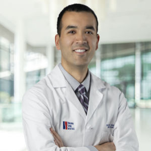 Co-author, Director of Research, and Spine Surgeon Colin Haines, MD