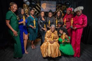 Buy From A Black Woman 2022 Business of the Year winners with Ms Idella Doe Slater, who inspired the Della Award