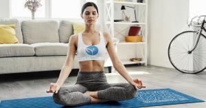 Woman with Stirling T-Shirt Does Yoga