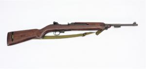 U.S. Winchester M1 .30 caliber carbine rifle, serial #1214950, overall 35 ¾ inches long with an 18 inch barrel, having a walnut stock with “BA/JPL” marked on the left side (est. $700-$900).