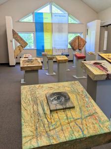 Approximately 193 pieces of artwork by Ludmila Pawlowska are on display at St. Martin's Lutheran Church in Annapolis. Here in the Fellowship Hall, several pieces give a nod to Ukraine. All of the artist's proceeds benefit Ukrainian refugees.