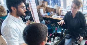 Pouring tables include key winery personnel and sommeliers discussing the wines and answering questions.