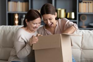 People having fun unboxing their online order