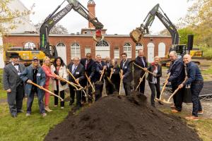 In this photo, State of New York Lieutenant Governor Antonio Delgado is seen with several members of the TSCW Board, including the Board Chair and Executive Director, as well as other volunteers and members.