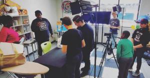 Our cohort of youth setting up to film a sewing masterclass at Streams Community Hub