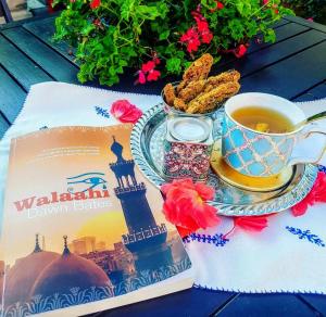 Copy of Walaahi and an ornate Arabic tea pot