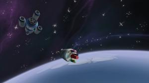 Animated space ships float above an earth looking planet in a still from from the fulldome film 3-2-1 Liftoff! (2022).