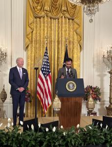 Imam Zia, an Afghan American Iman who was a refugee introducing the President