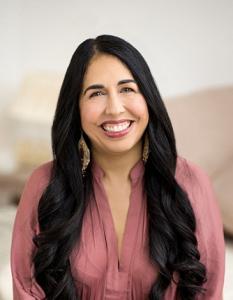 Author Tanmeet Sethi, M.D. smiling in a professional headshot image against a light background. white background